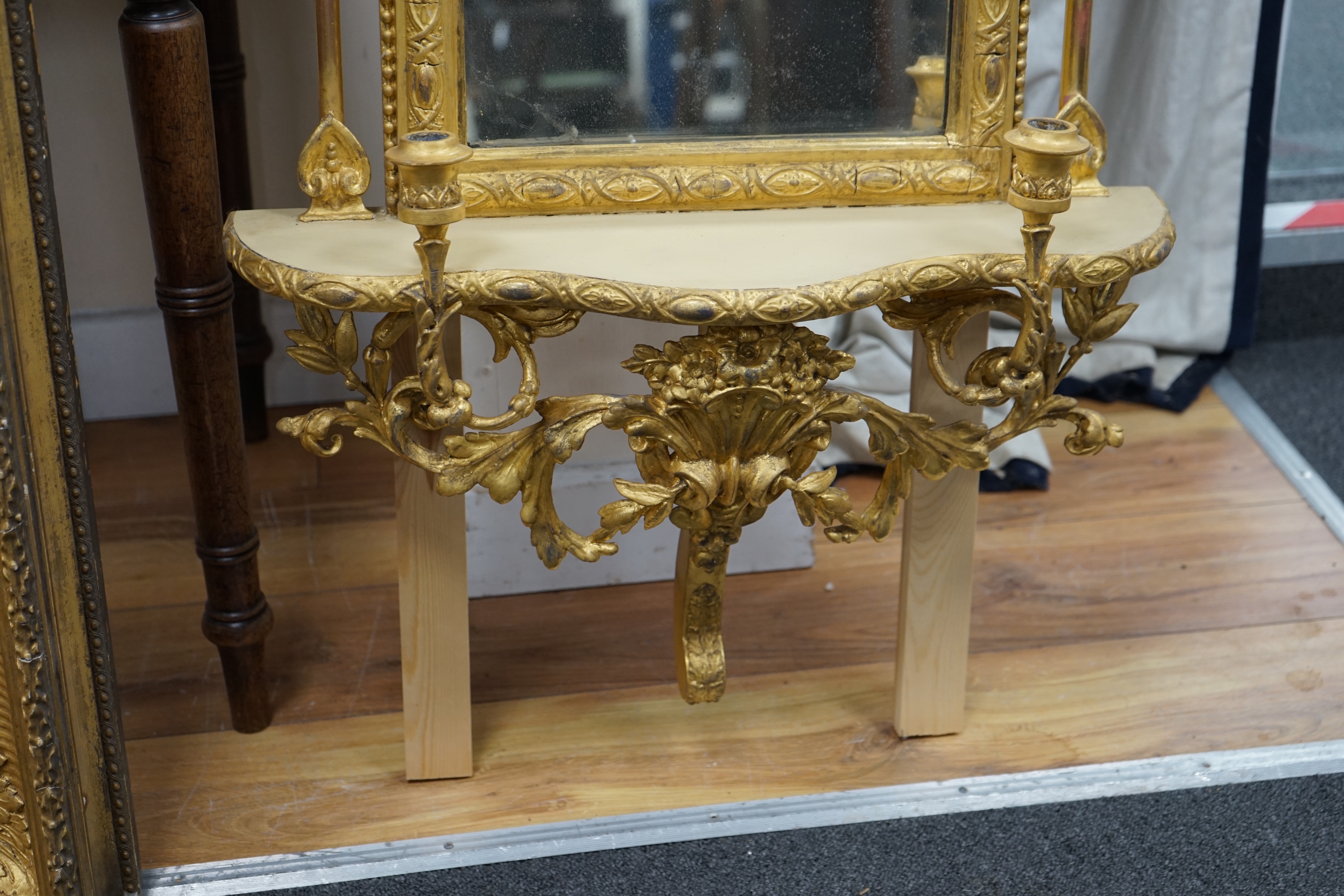 A 19th century giltwood and gesso girandole pier glass, width 54cm height approx. 155cm